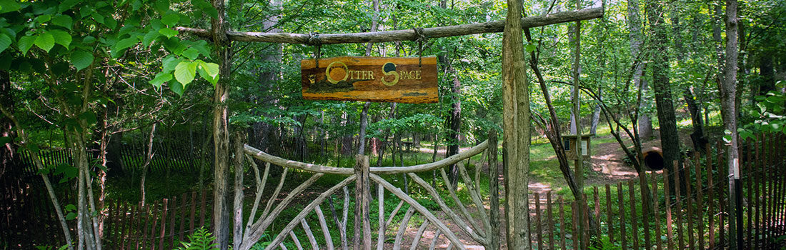 The rustic, wooden gate, to Otter Space