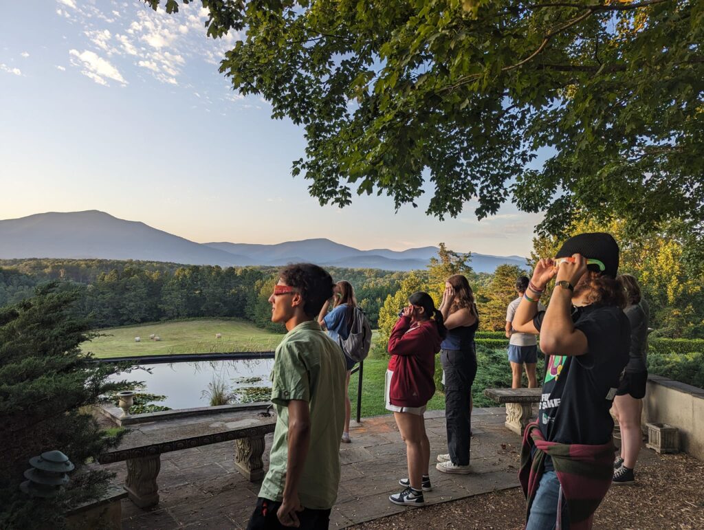 University of Lynchburg Astronomy students watching the sunset at Cloverlea Farmhouse and Memorial Gardens using Solar filter glasses, and measuring a to-scale model of our Solar System out at the Belk Observatory - University of Lynchburg planet walk!